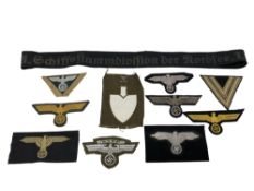A Group of German cloth insignia, mostly eagle emblems including NSKK example,