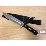 An "Old Timer" hunting knife, stamped "SCPROM-16-31", overall length including handle 39 cm,