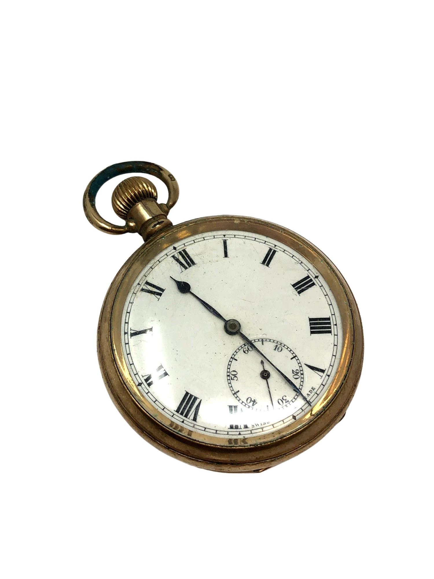 An open face pocket watch in Dennison case,