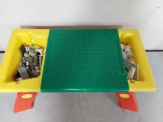 A Lego table containing Lego