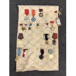 Approximately sixteen reproduction medals and badges of Russian/ Eastern European interest (16)