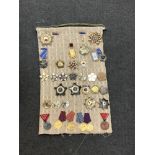 Approximately thirty-two reproduction medals and badges of Russian/ Eastern European interest (32)