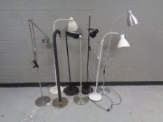 Eight various continental floor lamps