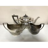 A silver three piece tea service, James Deakin and Sons,