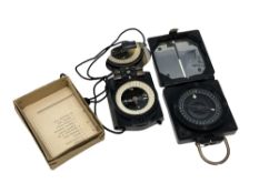 A Second World War Magnetic Marching Compass Mk I, together with a Pasto Walking Compass.