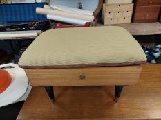 A 20th century teak storage footstool