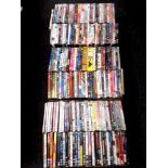 Three boxes containing a large quantity of DVDs,