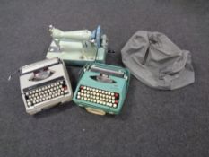 A Smith-Corona typewriter together with a Boots typewriter and vintage sewing machine (3)