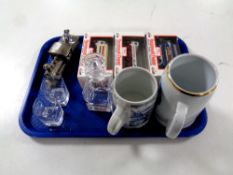 A tray containing an Aberdeen University miniature decanter with two shot glasses,