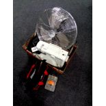 A box containing electric sewing machine, fan,