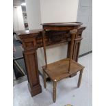 An oak fire surround together with a demi lune occasional table and one further low table