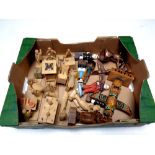 A box containing wooden tourist figures,