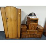 A burr walnut single door wardrobe with matching dressing table and bedside cabinet