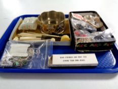 A tray containing miscellaneous to include a plated wine stand, manicure set, shell dish,