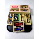 A tray containing six Lledo Days Gone Railway and Unigate die cast car packs