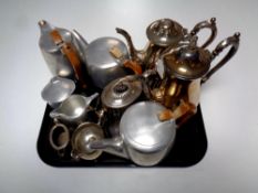 A tray containing metal wares to include plated tea ware,