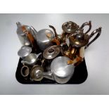 A tray containing metal wares to include plated tea ware,