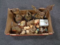 A box containing a collection of animal ornaments including Leonardo Collection,