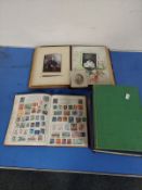 An album of world stamps together with a small quantity of antiquarian books,
