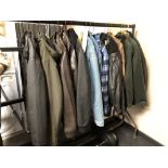 Approximately fourteen gent's jackets and coats including two brown leather jackets, denim jackets,