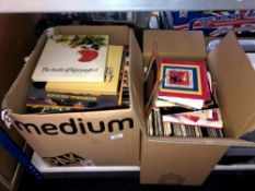 Two boxes containing a quantity of vinyl LPs and 45s,