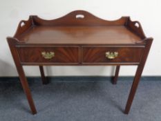 A reproduction mahogany wash stand in the Georgian style,