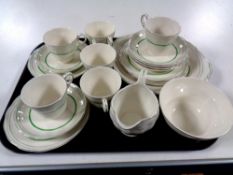 A tray containing approximately twenty-one pieces of Grindley Creampetal tea china