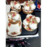 A tray containing approximately thirty-seven pieces of Royal Albert Old Country Roses tea china