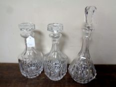 Three cut glass lead crystal decanters
