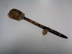 An eastern tourist tortoiseshell backed instrument