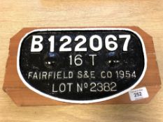 A metal railway locomotive plaque - "B122067 16 T FAIRFIELD S & E CO 1954 LOT No 2382",