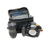 A Nikon F4 camera body numbered 2244123, in carry bag together with a Nikon AF Nikkor 35-135mm lens,