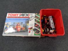 A Tomy AFX Formula One Team Challenge racing set together with a box containing unboxed die cast