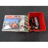 A Tomy AFX Formula One Team Challenge racing set together with a box containing unboxed die cast