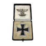 A German Iron Cross 1st Class, in case of issue, together with an Iron Cross Eagle clasp.