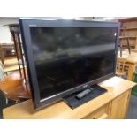 A Sony Bravia 37'' LCD TV with remote