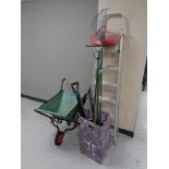 A folding aluminium stepladder together with a folding barrow and a quantity of garden tools