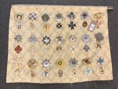 Approximately forty-two reproduction medals and badges of Russian/ Eastern European interest (42)