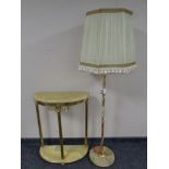 A brass and onyx two tier demi lune table together with a similar standard lamp with shade