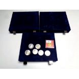 Three Royal Mint Coin Collector's cases together with six assorted crowns and a Winston Churchill