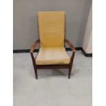 A 20th century beech framed armchair