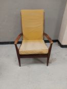 A 20th century beech framed armchair