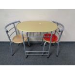 A contemporary oval kitchen table with two stowaway chairs