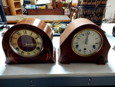 An oak Art Deco mantel clock together with one further oak mantel clock