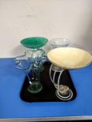 A tray containing a cut glass vase together with a further vase and two glass pedestals