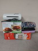 A boxed halogen heater, boxed halogen over, new bedding,