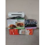 A boxed halogen heater, boxed halogen over, new bedding,