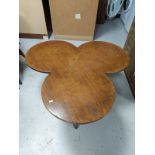 An oak clover shaped coffee table
