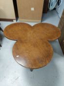 An oak clover shaped coffee table