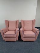 A pair of 1930's wingback armchairs